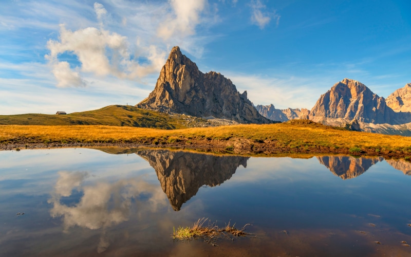 Dolomites Mountains Reflection in Lake, Italy