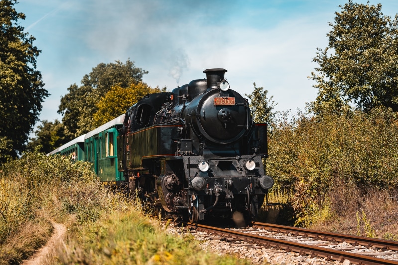 Steam Train 433001 on Railroad Tracks