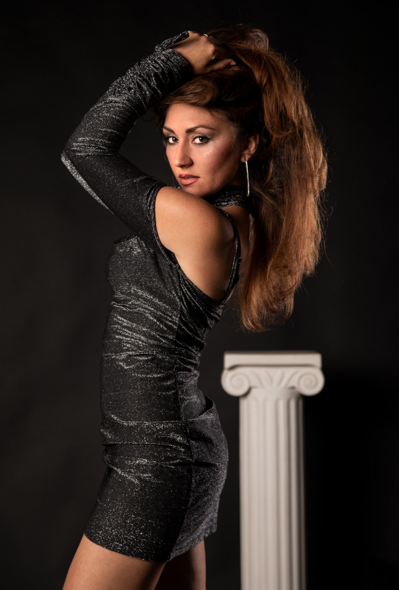 Antea Mistica in a sparkling dress posing