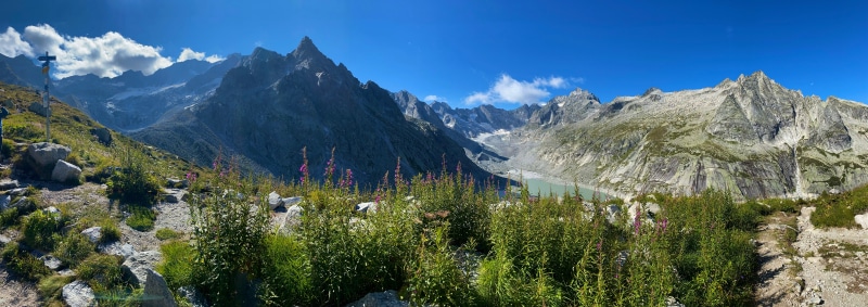 Panorama of the Swiss Alps with a Glacier Lake
