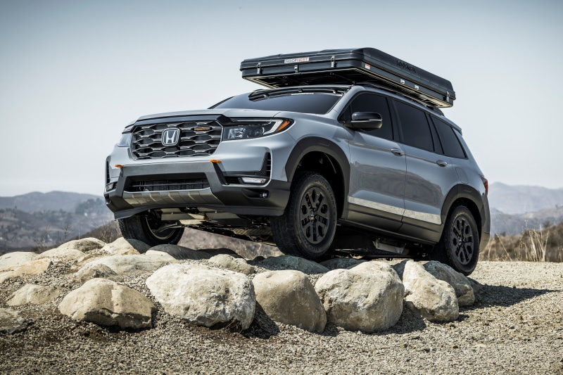 Honda Passport TrailSport SUV on Rocks with Roof Tent