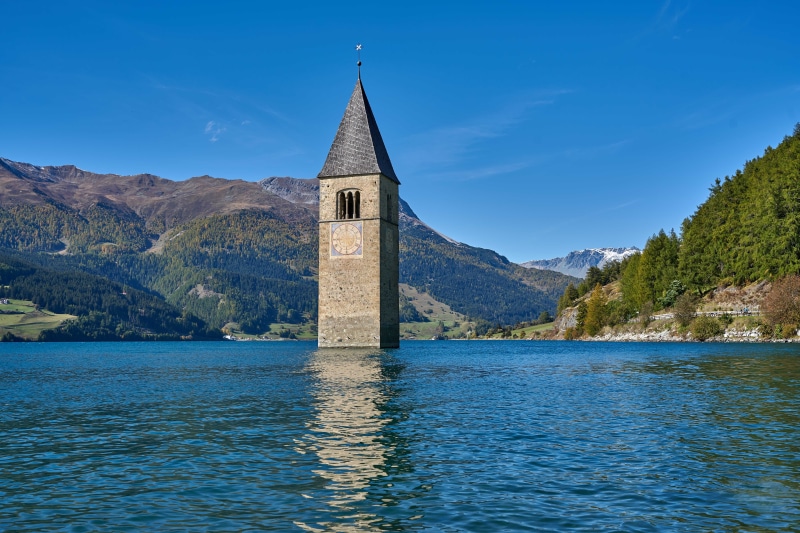 Sunken church tower in Reschensee, South Tyrol, Italy