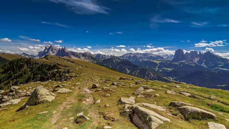 Val di Funes, Italy: Mountains and Stones Under Clouds