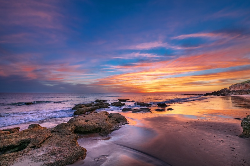 Sunset over the rocky coast of Andalusia, Spain