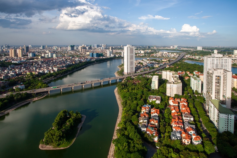 Hanoi, Vietnam: Hong River and Cityscape with Bridge