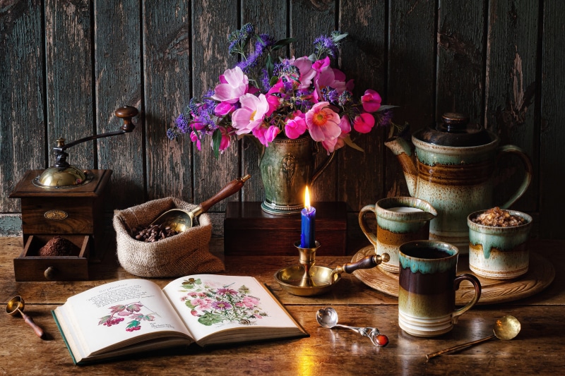 Still-life with coffee, flowers, and book