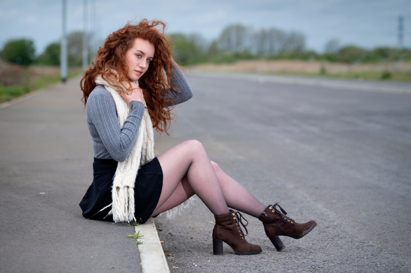 Lydia, Redhead Girl Sitting on Road with Scarf and Boots