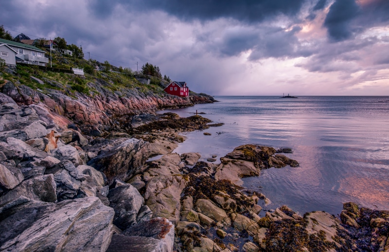 Norway Coastline with Red House and Lighthouse