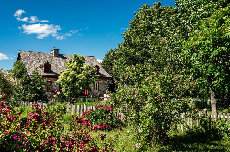 Stone house with garden on Orleans Island, Quebec, Canada
