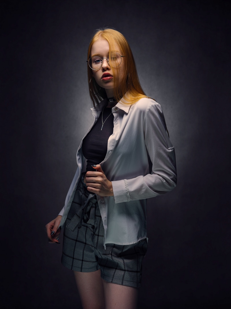 Redhead girl with glasses by Nikolay Bobrovsky