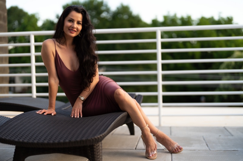 Victoria Bell sitting on a lounge chair