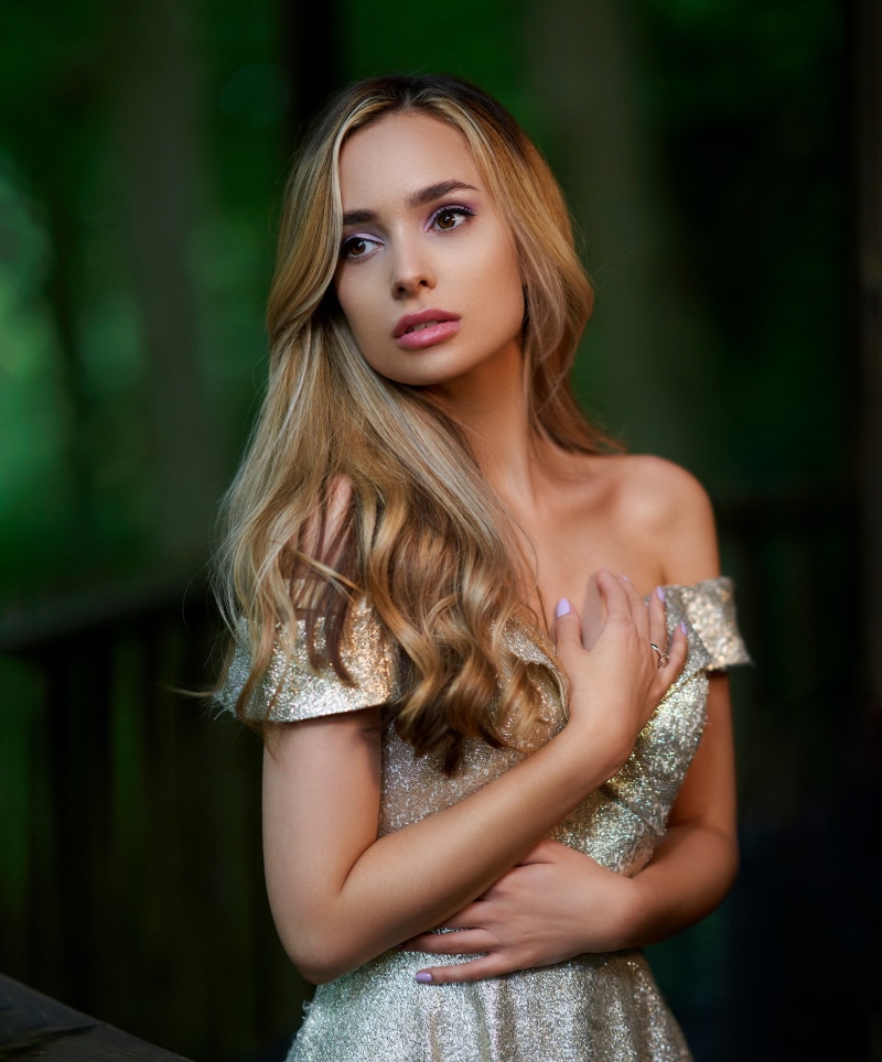 Woman in a sparkly off-the-shoulder dress
