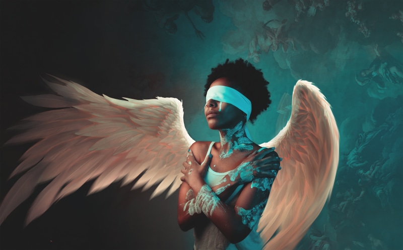 Blindfolded Angel with White Wings
