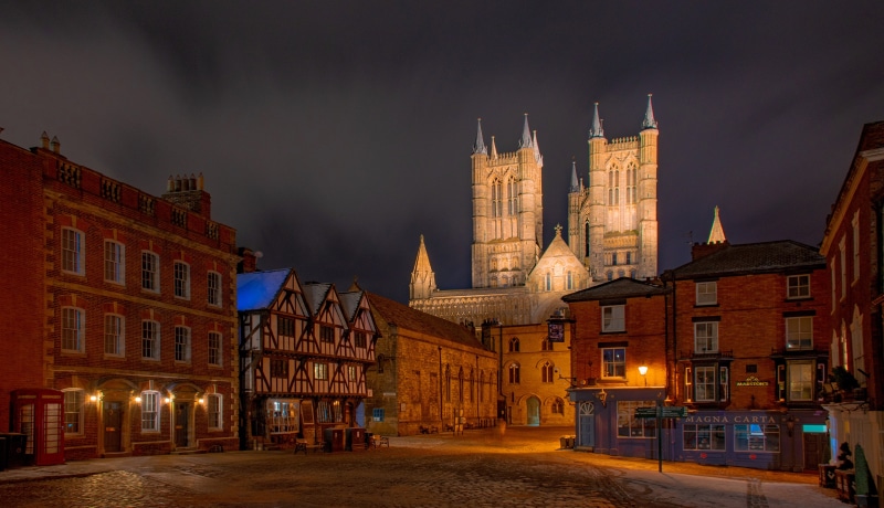 Lincoln Cathedral and historic buildings at night