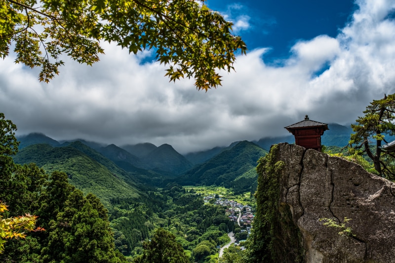 Temple on a cliff overlooking a valley in Japan