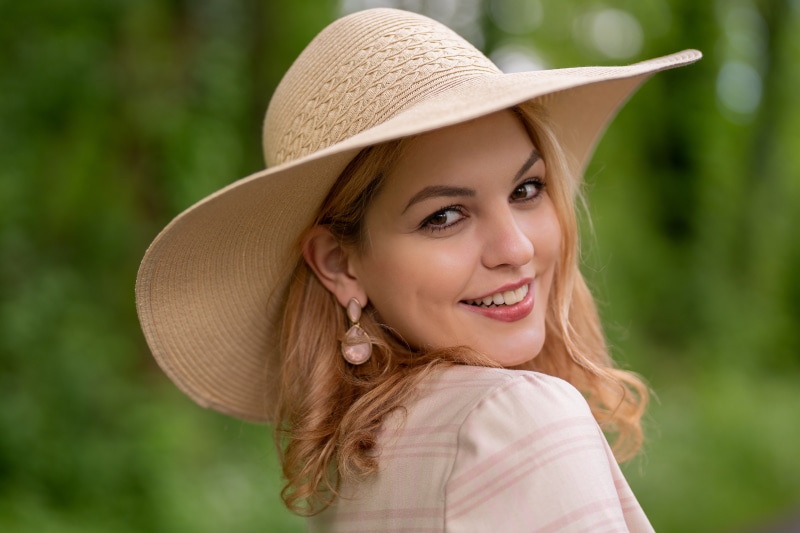 Kerstin wearing a hat and smiling