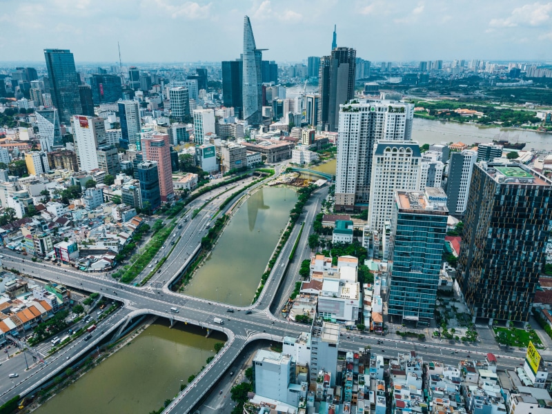 Ho Chi Minh City skyline with river and bridges from above