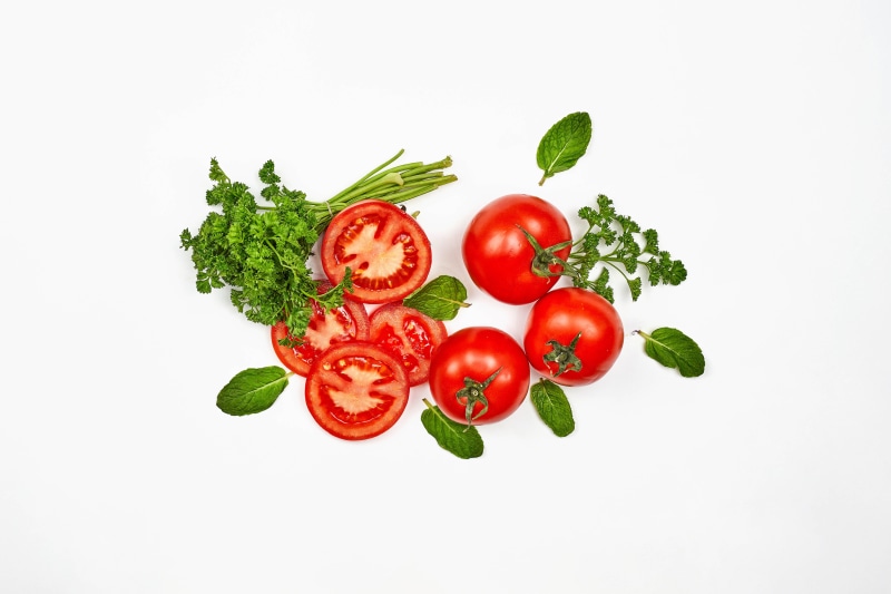 Tomatoes, Parsley, and Mint on White Background