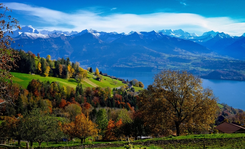 Autumn landscape with mountains and lake in Switzerland