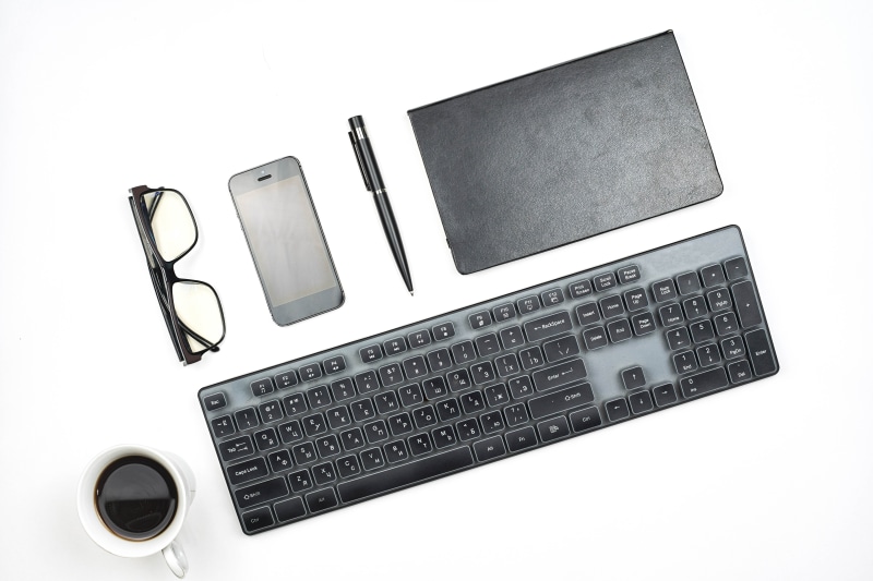 Keyboard, Glasses, Smartphone, Pen, Notebook, and Coffee Cup