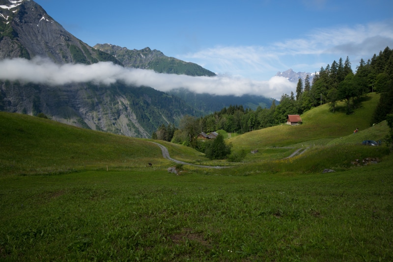 Switzerland Mountains Grasslands Scenery Clouds