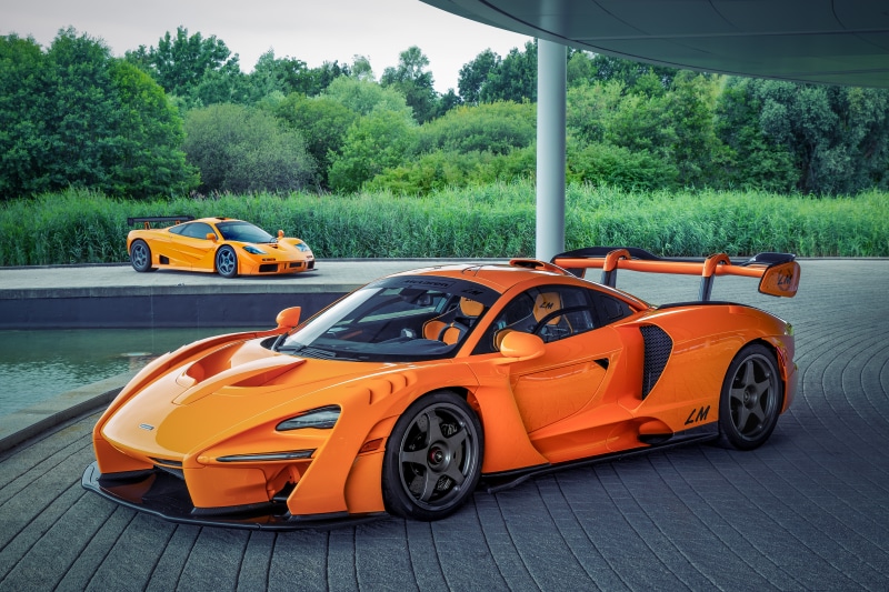 Two orange McLaren sports cars