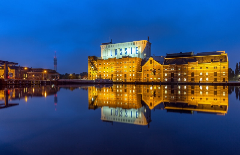 Lassie building reflected in water at Wormer, Netherlands