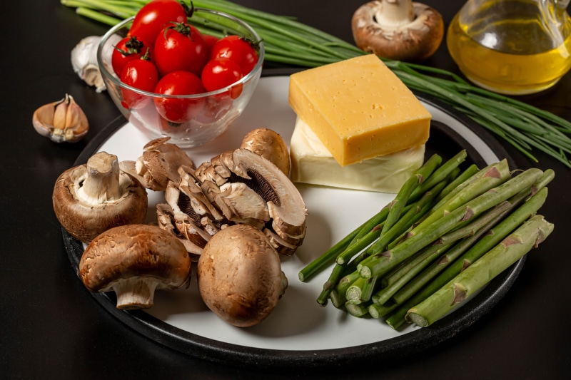 Vegetables, Mushrooms, Tomatoes, Cheese, Garlic, and Oil