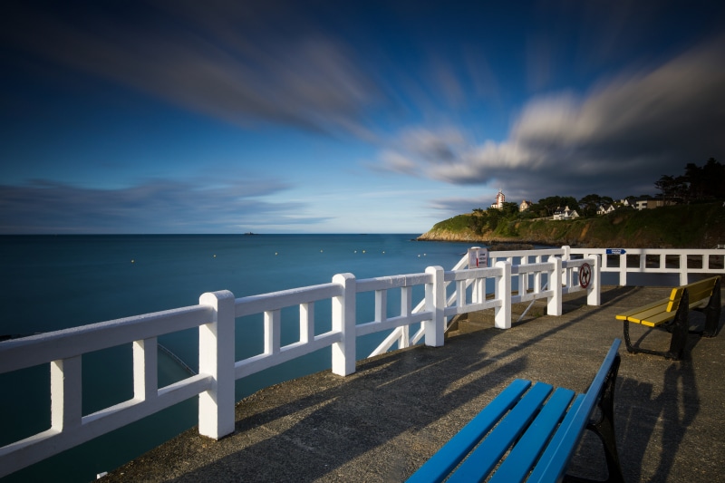Bretagne, France Waterfront with Clouds and Benches