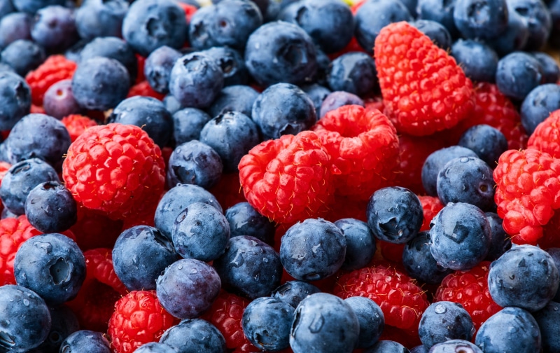 Many Blueberries and Raspberries