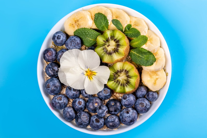 Muesli with Blueberries, Bananas, Kiwi, and Flower