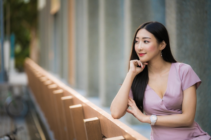 Asian woman in a pink dress