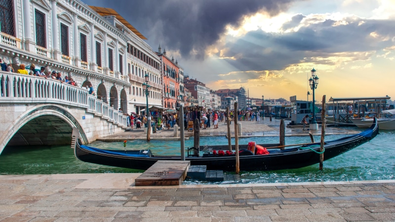 Venice Canal with Gondola and Rialto Bridge