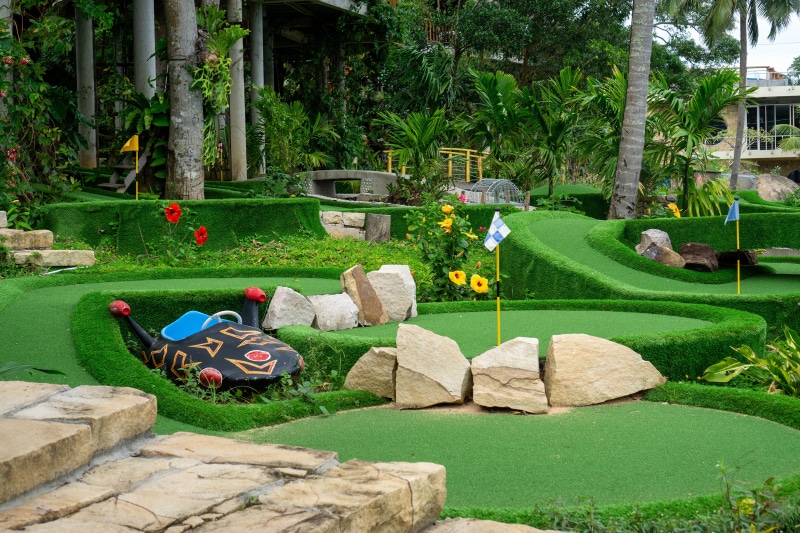 Mini golf course with artificial turf and rocks in Vietnam