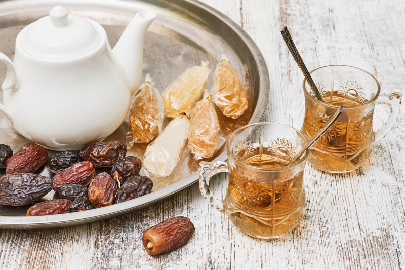 Tea, Kettle, Dates, and Candy on a Tray