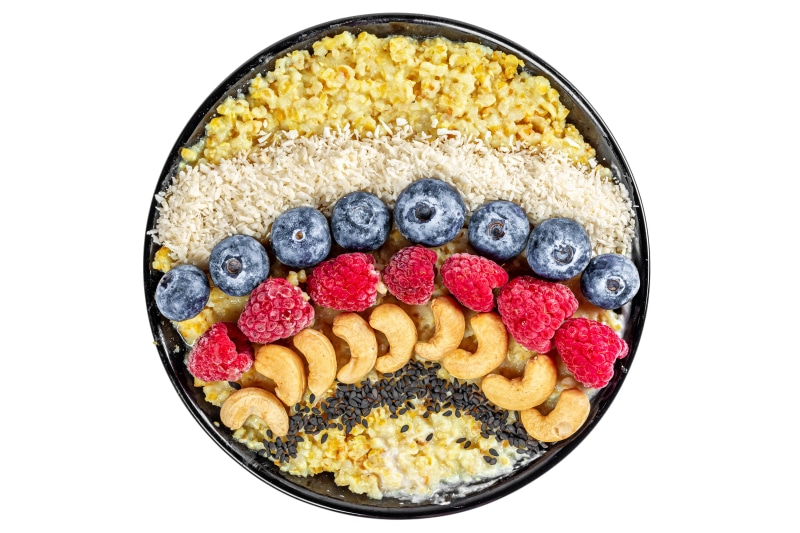 Porridge with Blueberries, Raspberries, Cashews, and Seeds