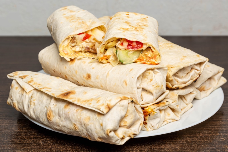 Shawarma wraps with vegetables on a plate