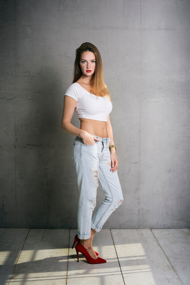 Sylvana in white singlet and ripped jeans