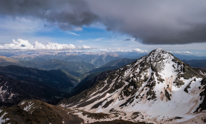 Coma Pedrosa Mountains in Andorra with Clouds