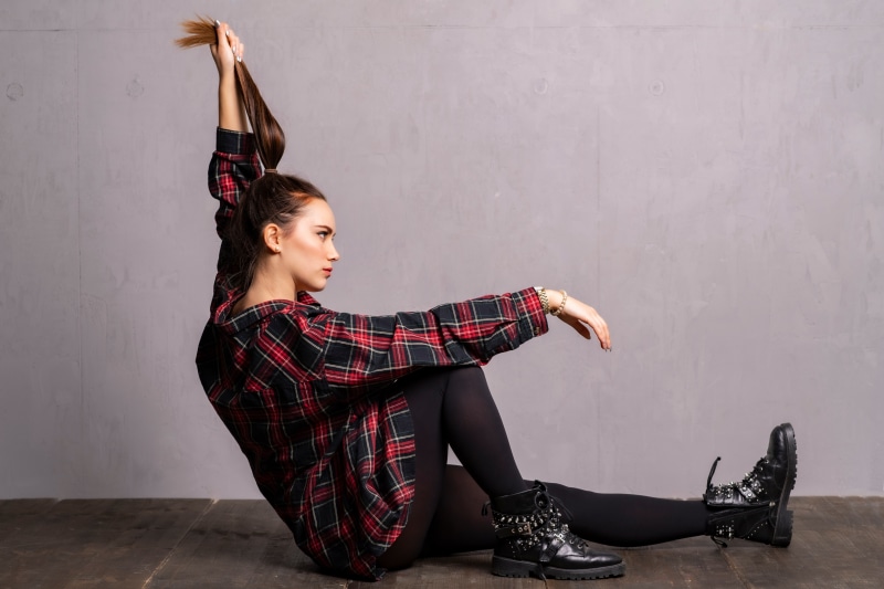 Woman in Plaid Shirt and Boots