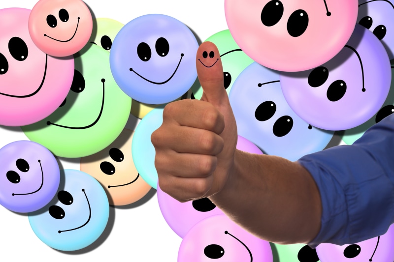 Thumbs Up with Colorful Smileys