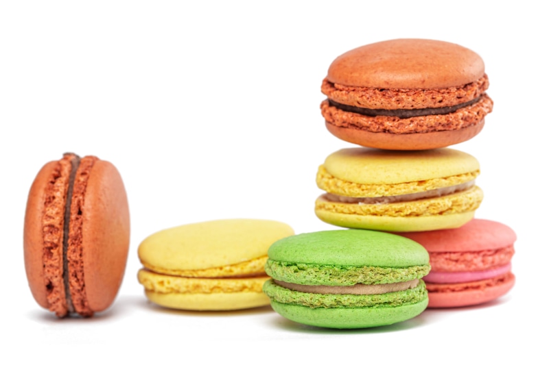 Assortment of colorful macarons on a white background