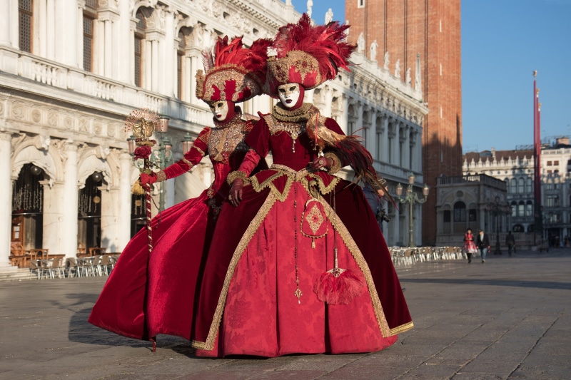 Two people in Venetian carnival costumes in Venice