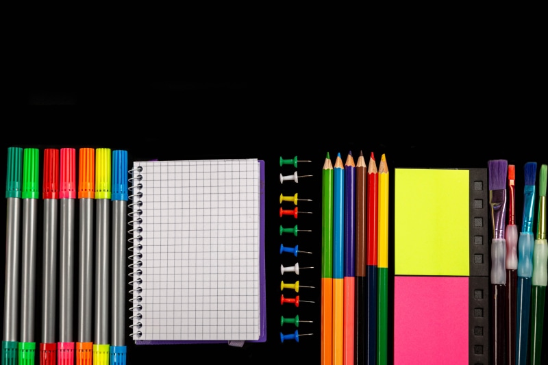 School Supplies on Black Background