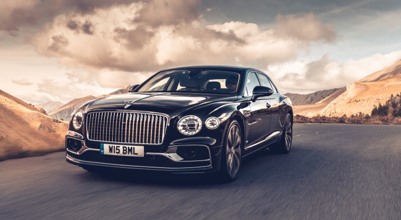 Bentley Flying Spur (Dark Sapphire) on a Mountain Road