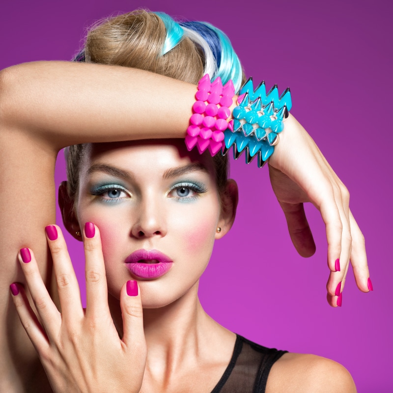 Model with colorful hair and bracelets