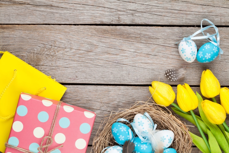 Easter Eggs, Tulips, and Gifts on Wood
