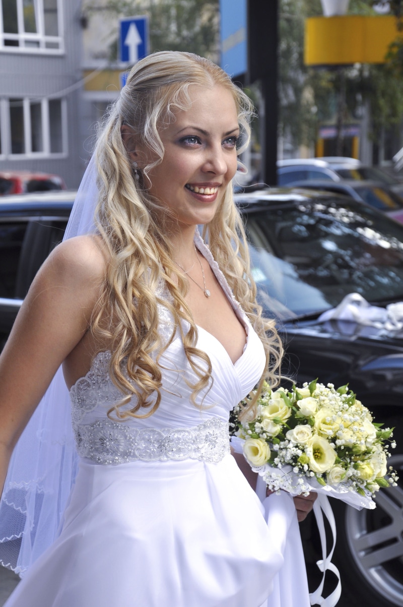 Bride in a white dress holding a bouquet