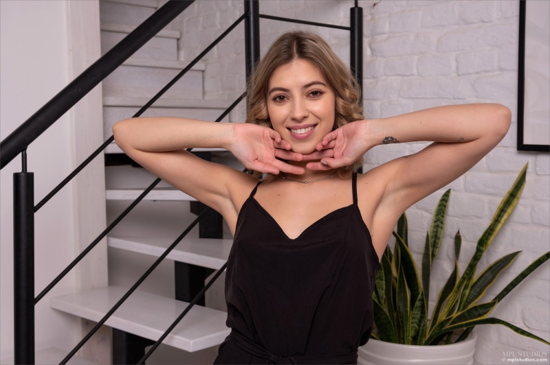 Avery 1997 in a black dress