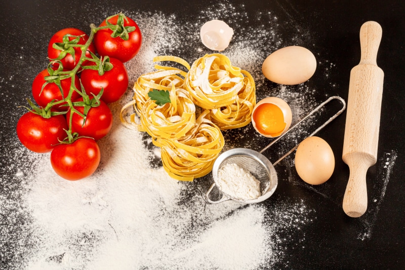 Tomatoes, Pasta, Eggs, Flour, and Rolling Pin